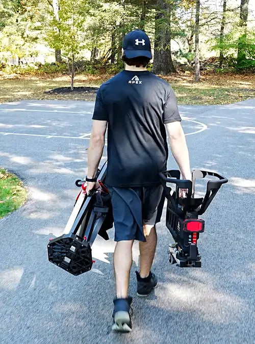 man carries apex to home court hoop