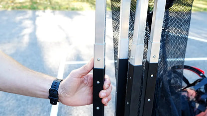 close up showing the adjustable height poles to change the net height on apex shooting machine