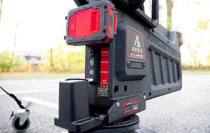 tight crop of back side of apex shooting machine showing ports