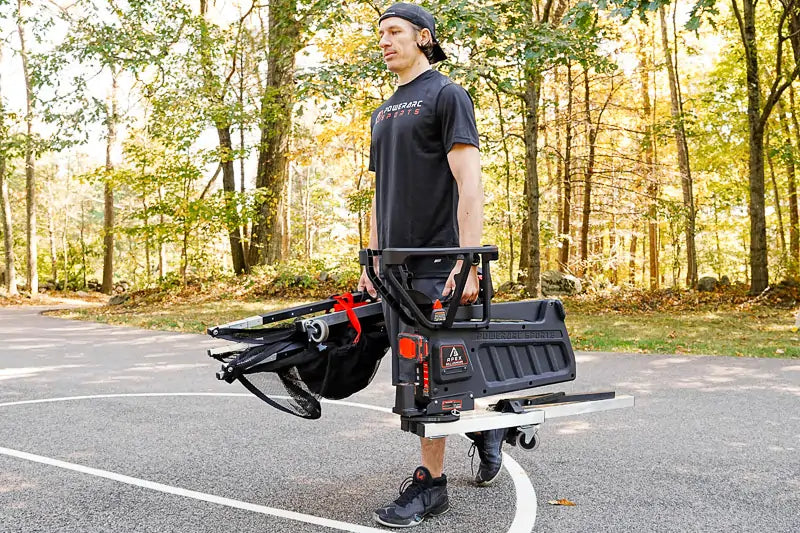 man carries apex shooting machine with ease