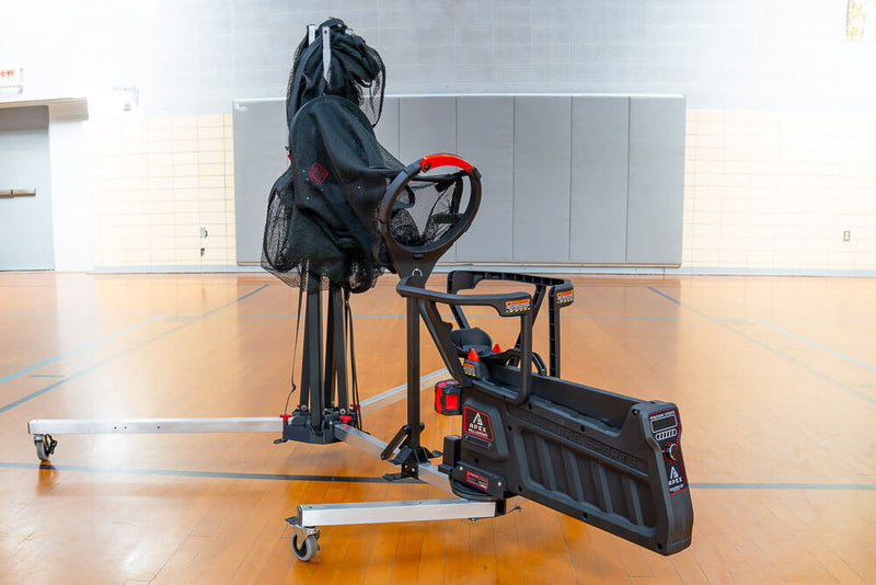 APEX basketball shooting machine in gym setting